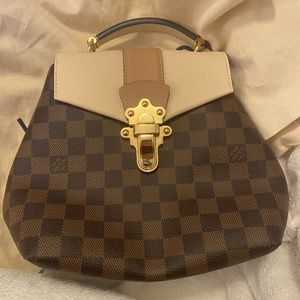 LV Clapton Bookbag in cream